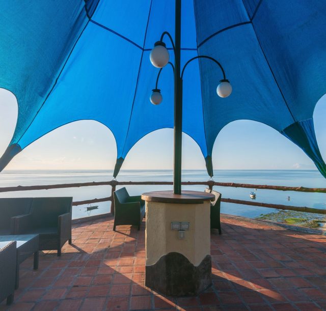 A seating arrangement below a canopy overlooking the Indian Ocean beach, Bahari Beach hotel Nyali.