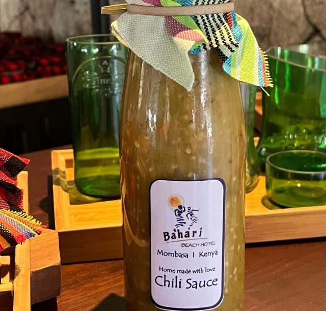A jar of home made chilli sauce at Bahari beach hotel for sustainable tourism.