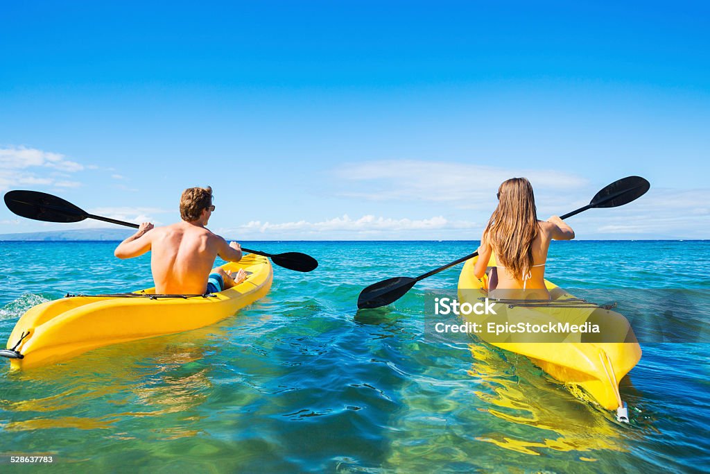 Couple Kayaking in the Ocean on Vacation